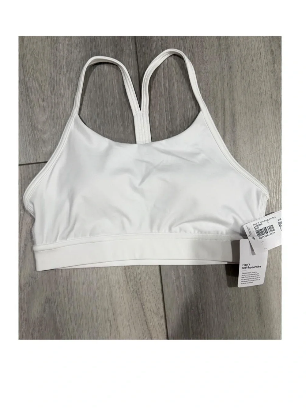 lululemon athletica White Flow Y Nulu Bra. Mid Support B/C Cup  —  Size 4